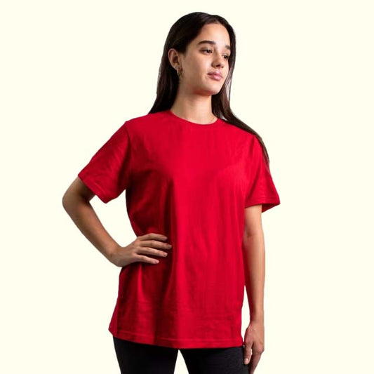 Person wearing a red t-shirt on a plain background